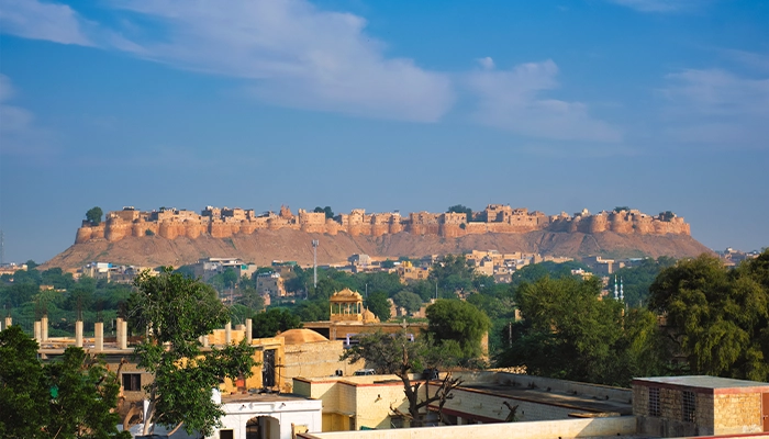 a city with a hill in the background